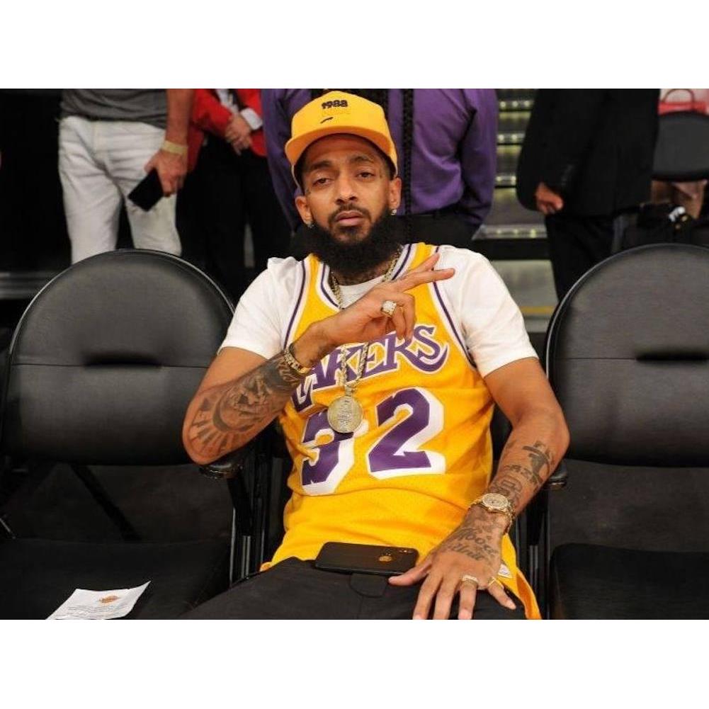 XXL Magazine on X: Two years ago today Nipsey Hussle got ready to throw  hands in the Lakers and Rockets fight 😂😂😂 Rest In Peace, Nip 🏁   / X